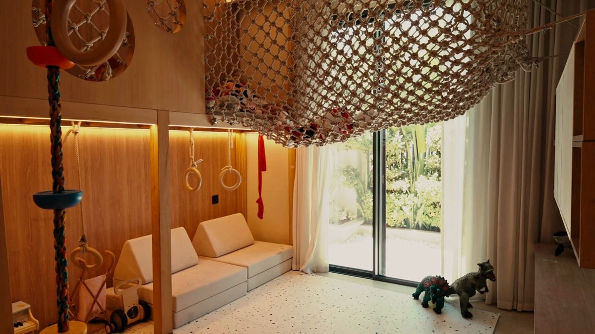 Playroom with hanging net and swing